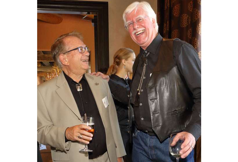 Foundation patron Tom Azzari shares a laugh with Tim Newton, chairman of the board of the Salmagundi Club.