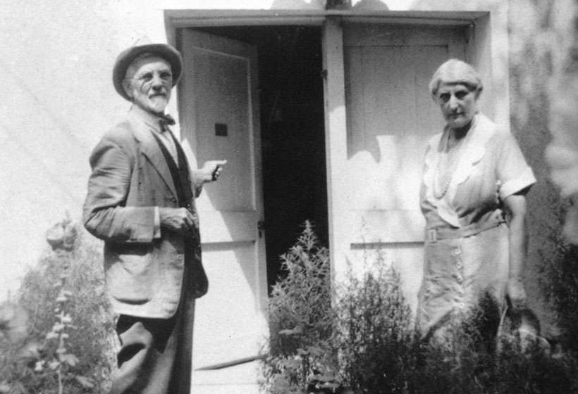 Sharp and his wife, Louise, outside his studio in Taos.